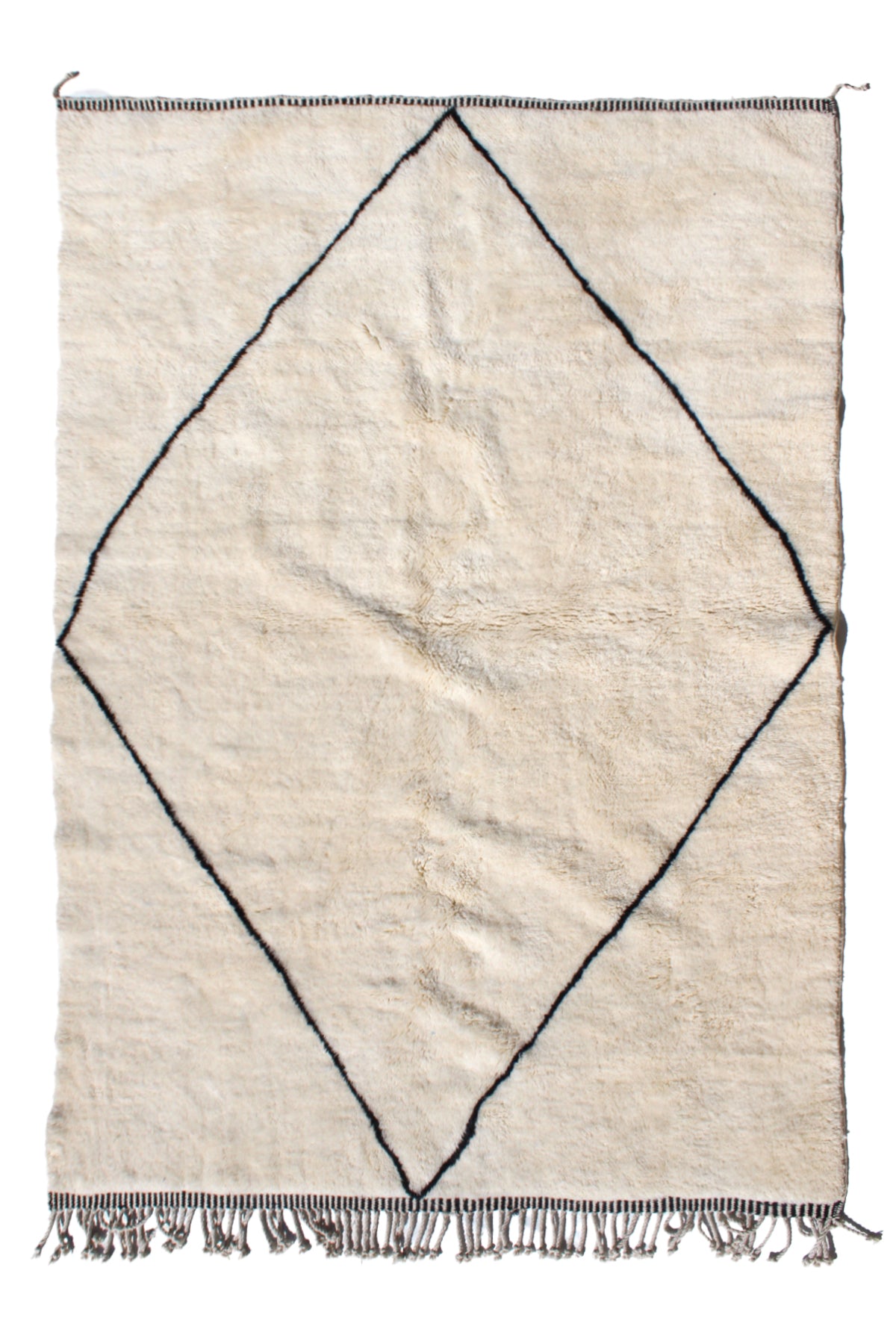 Handmade Beni Ourain Moroccan rug made from natural wool by Berber women artisans in the Atlas Mountains