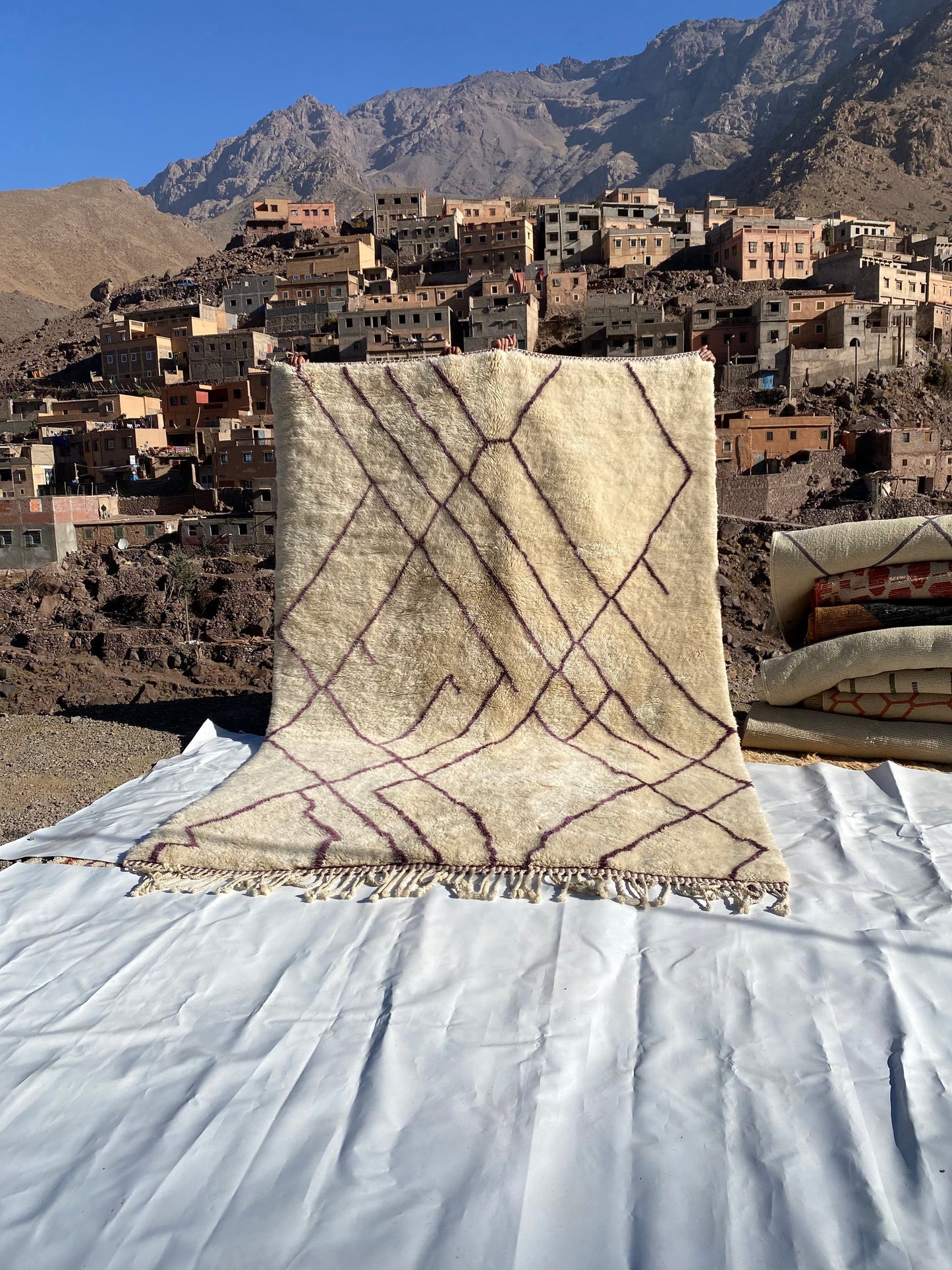 Beni Ourain rugs originate from the Atlas Mountains of Morocco and are characterized by their distinctive, neutral-toned, and geometric designs. These handwoven rugs often feature a plush pile and are made by the Berber tribes,  size is 310x210 cm