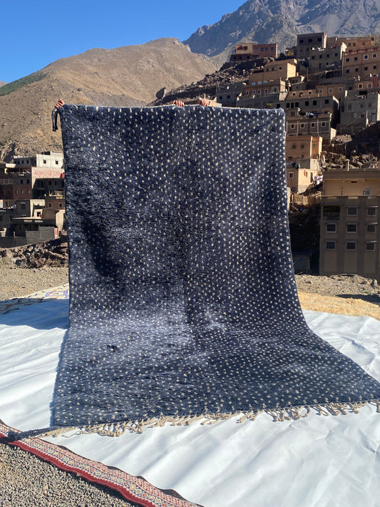 Beni Ourain rugs originate from the Atlas Mountains of Morocco and are characterized by their distinctive, neutral-toned, and geometric designs. These handwoven rugs often feature a plush pile and are made by the Berber tribes,  size is 320x190 cm