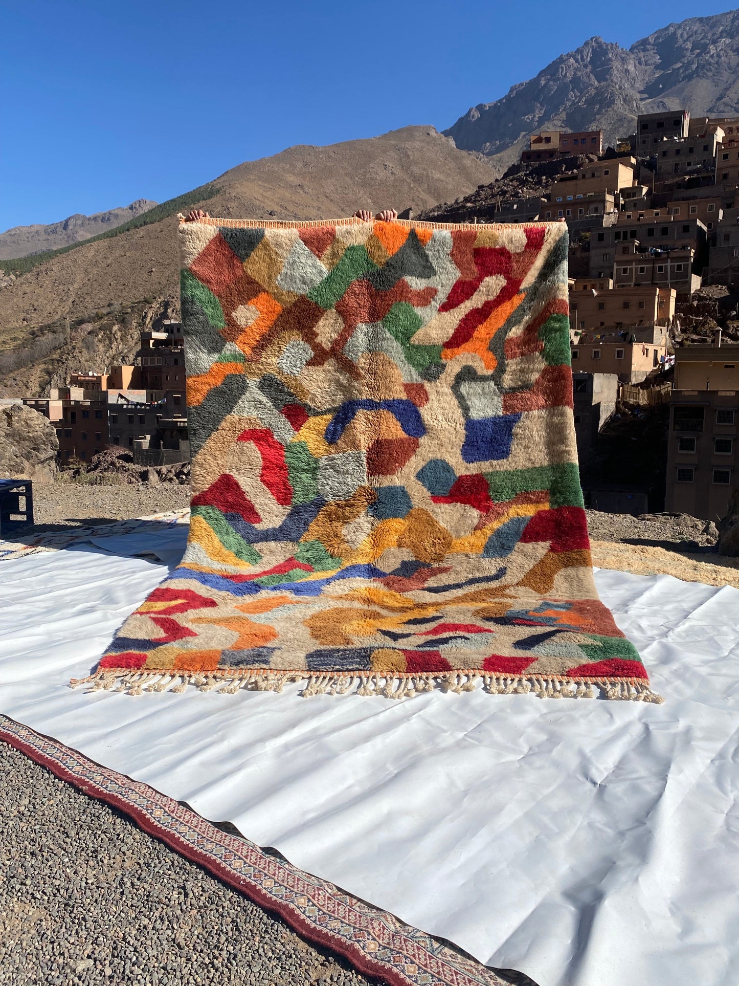 Beni Ourain rugs originate from the Atlas Mountains of Morocco and are characterized by their distinctive, neutral-toned, and geometric designs. These handwoven rugs often feature a plush pile and are made by the Berber tribes,  size is 300x200 cm