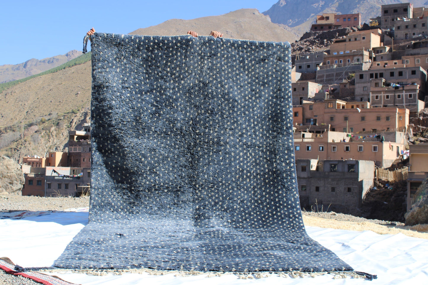 Beni Ourain rugs originate from the Atlas Mountains of Morocco and are characterized by their distinctive, neutral-toned, and geometric designs. These handwoven rugs often feature a plush pile and are made by the Berber tribes,  size is 320x190 cm