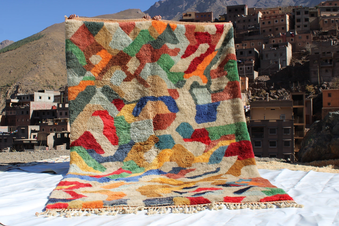 Beni Ourain rugs originate from the Atlas Mountains of Morocco and are characterized by their distinctive, neutral-toned, and geometric designs. These handwoven rugs often feature a plush pile and are made by the Berber tribes,  size is 300x200 cm