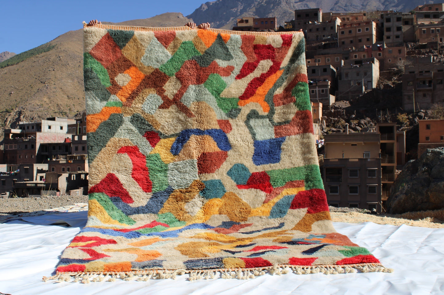 Beni Ourain rugs originate from the Atlas Mountains of Morocco and are characterized by their distinctive, neutral-toned, and geometric designs. These handwoven rugs often feature a plush pile and are made by the Berber tribes,  size is 300x200 cm