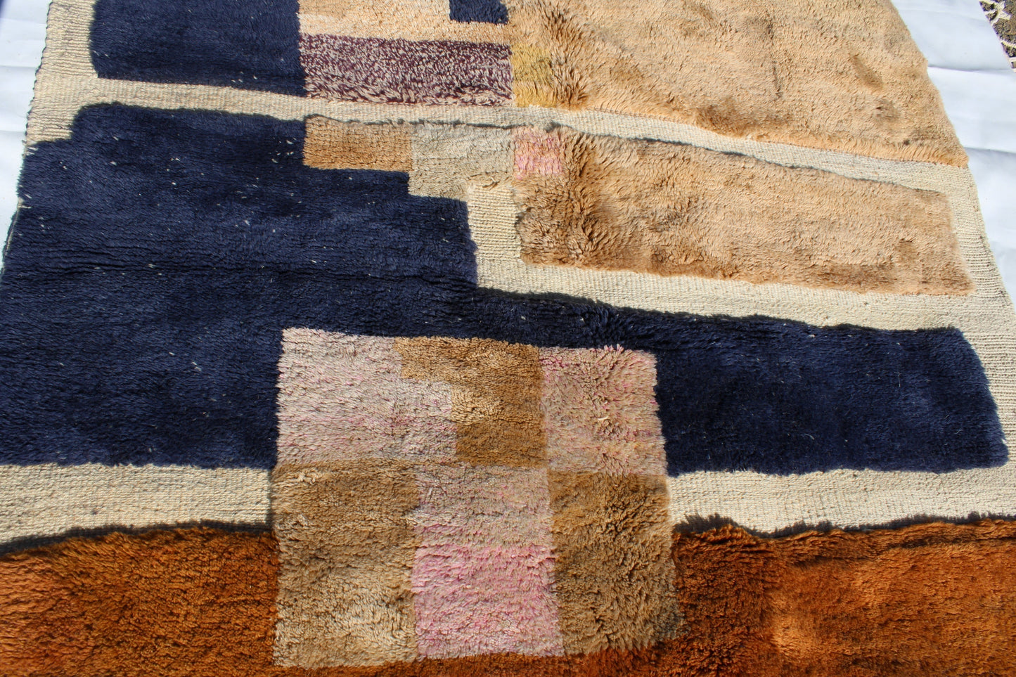 Beni Ourain rugs originate from the Atlas Mountains of Morocco and are characterized by their distinctive, neutral-toned, and geometric designs. These handwoven rugs often feature a plush pile and are made by the Berber tribes,  size is 260x165 cm