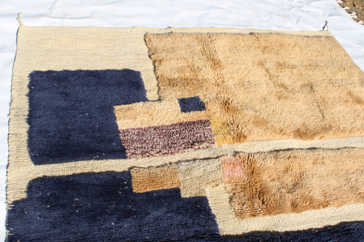 Beni Ourain rugs originate from the Atlas Mountains of Morocco and are characterized by their distinctive, neutral-toned, and geometric designs. These handwoven rugs often feature a plush pile and are made by the Berber tribes,  size is 260x165 cm