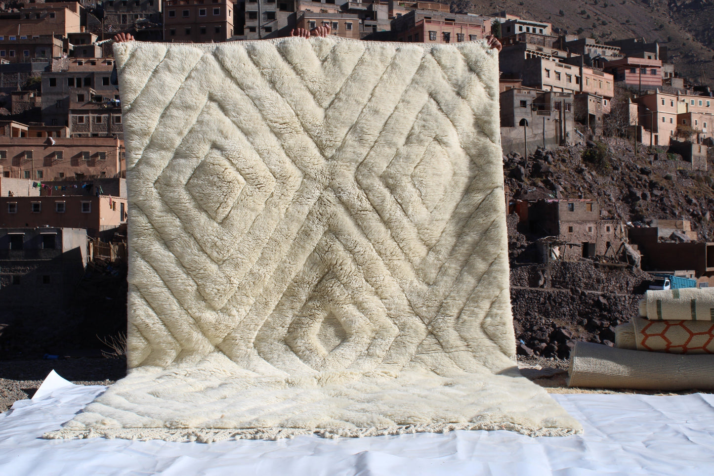 Beni Ourain rugs originate from the Atlas Mountains of Morocco and are characterized by their distinctive, neutral-toned, and geometric designs. These handwoven rugs often feature a plush pile and are made by the Berber tribes,  size is 300x200 cm