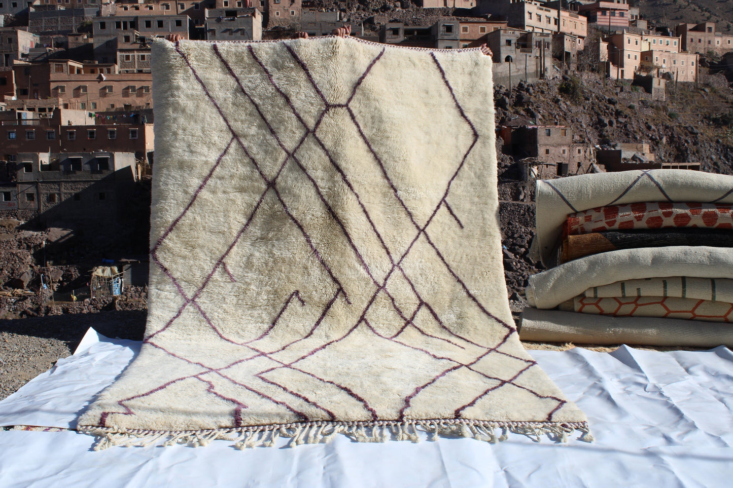 Beni Ourain rugs originate from the Atlas Mountains of Morocco and are characterized by their distinctive, neutral-toned, and geometric designs. These handwoven rugs often feature a plush pile and are made by the Berber tribes,  size is 310x210 cm