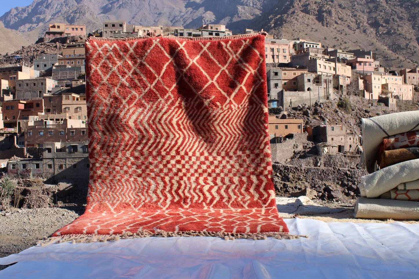 Beni Ourain rugs originate from the Atlas Mountains of Morocco and are characterized by their distinctive, neutral-toned, and geometric designs. These handwoven rugs often feature a plush pile and are made by the Berber tribes,  size is 270x168 cm