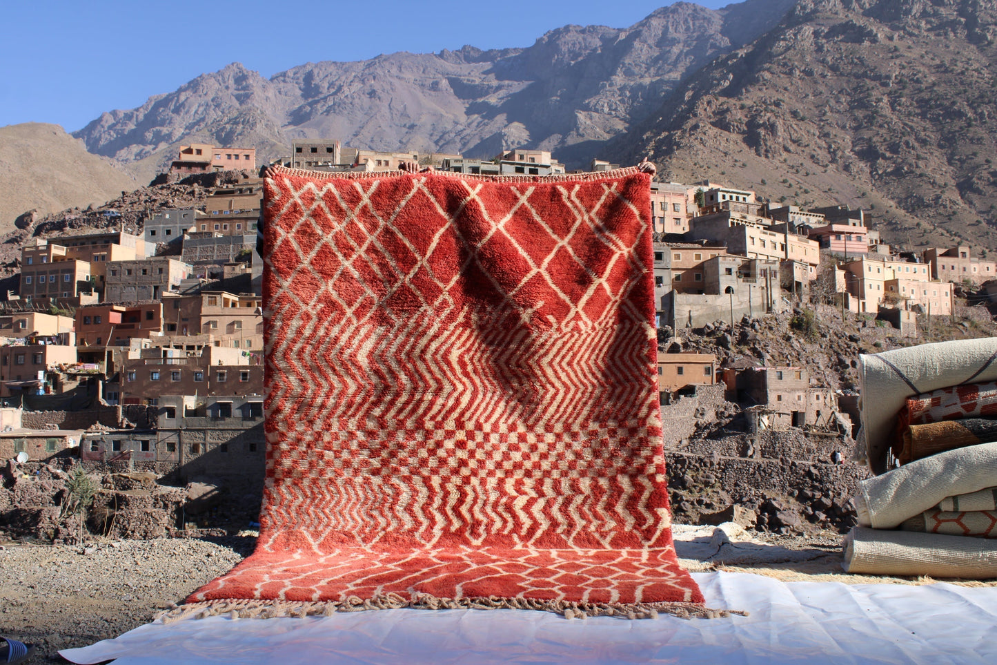 Beni Ourain rugs originate from the Atlas Mountains of Morocco and are characterized by their distinctive, neutral-toned, and geometric designs. These handwoven rugs often feature a plush pile and are made by the Berber tribes,  size is 270x168 cm