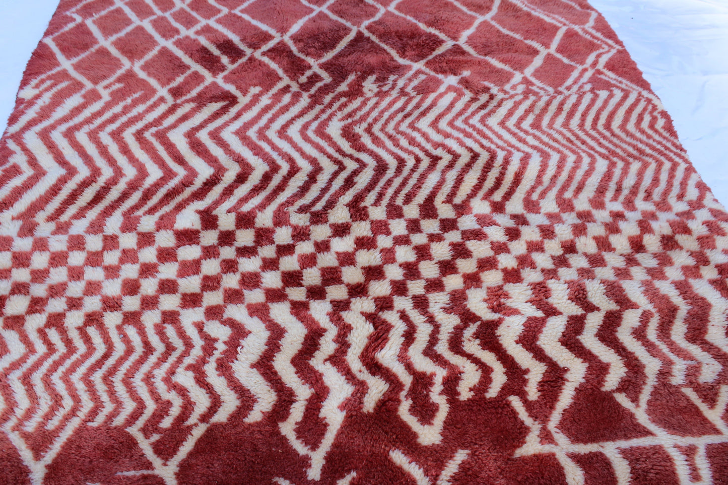 Beni Ourain rugs originate from the Atlas Mountains of Morocco and are characterized by their distinctive, neutral-toned, and geometric designs. These handwoven rugs often feature a plush pile and are made by the Berber tribes,  size is 270x168 cm