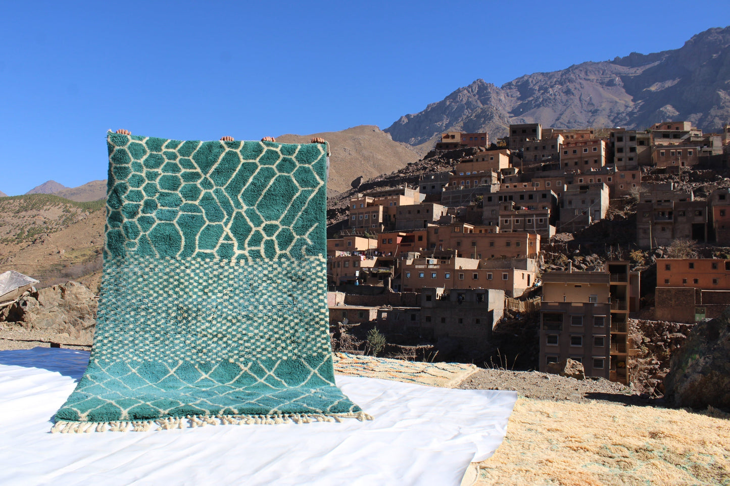 Beni Ourain rugs originate from the Atlas Mountains of Morocco and are characterized by their distinctive, neutral-toned, and geometric designs. These handwoven rugs often feature a plush pile and are made by the Berber tribes,  size is 260x192 cm