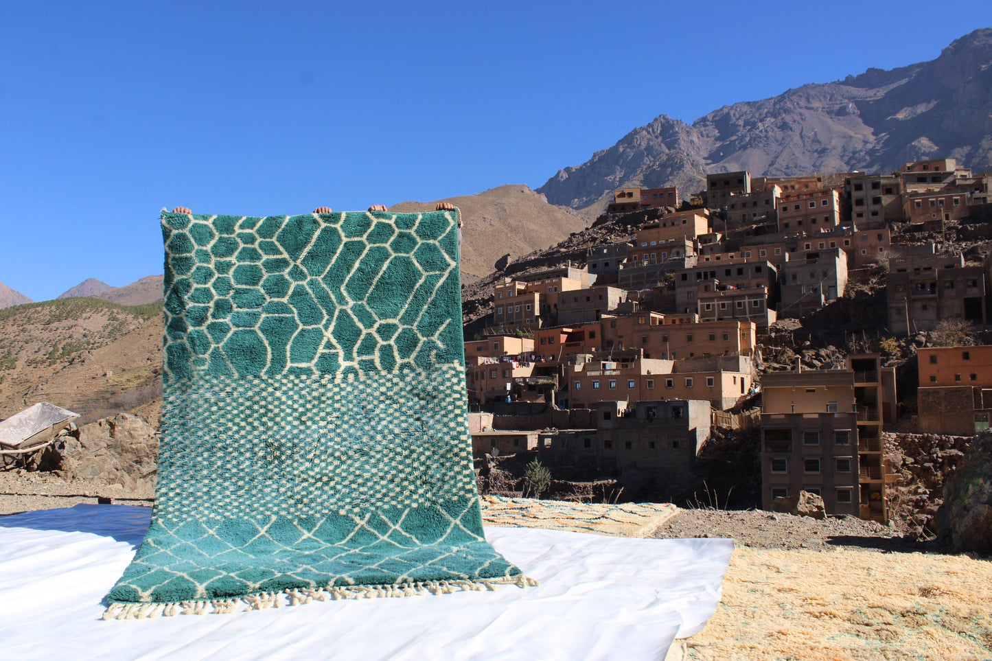 Beni Ourain rugs originate from the Atlas Mountains of Morocco and are characterized by their distinctive, neutral-toned, and geometric designs. These handwoven rugs often feature a plush pile and are made by the Berber tribes,  size is 260x192 cm