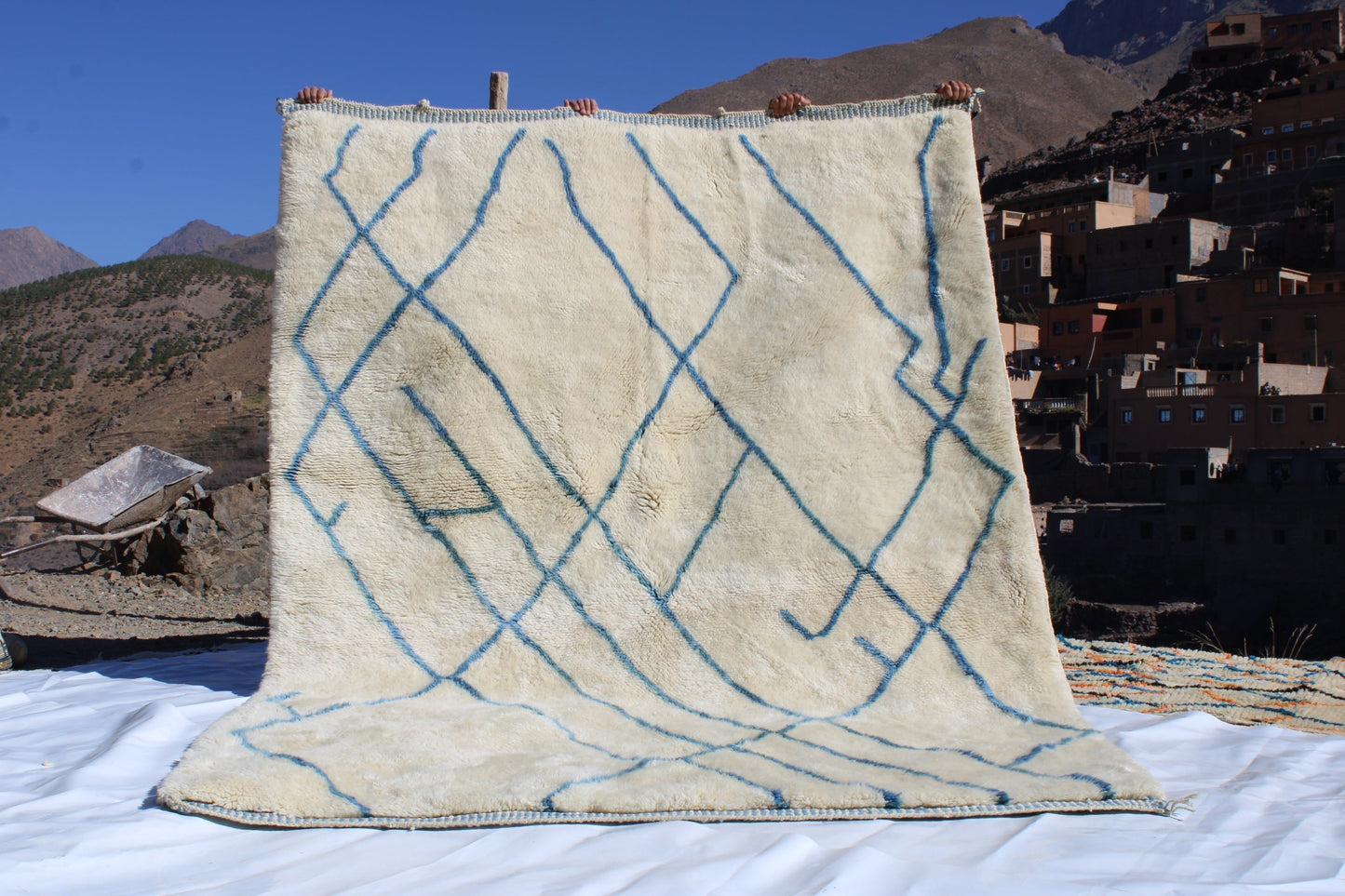 Beni Ourain rugs originate from the Atlas Mountains of Morocco and are characterized by their distinctive, neutral-toned, and geometric designs. These handwoven rugs often feature a plush pile and are made by the Berber tribes,  size is 270x192 cm