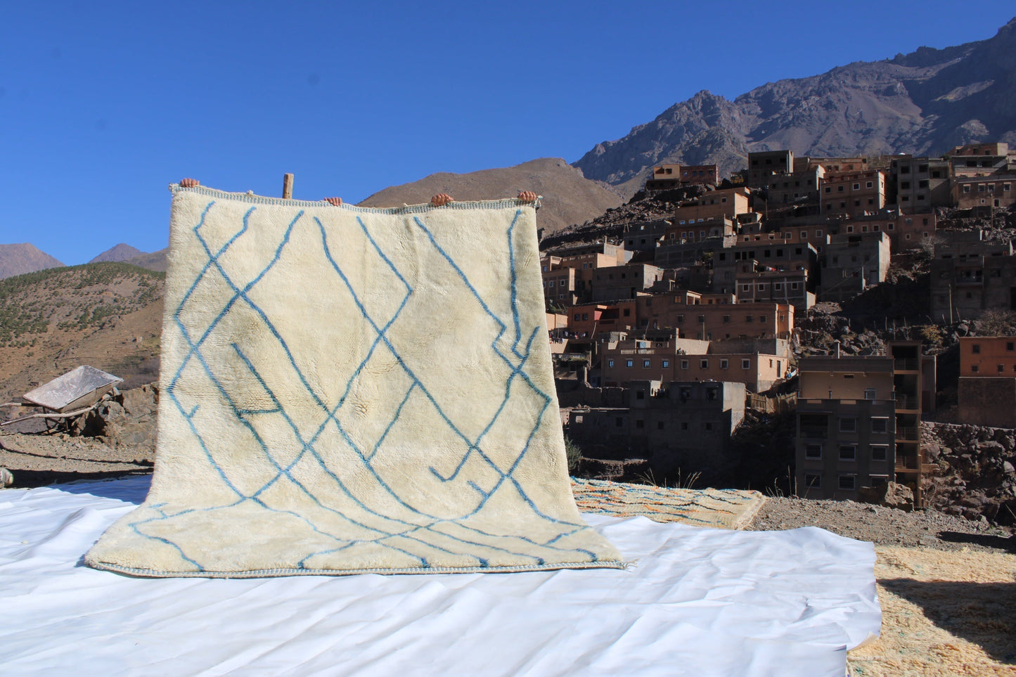 Beni Ourain rugs originate from the Atlas Mountains of Morocco and are characterized by their distinctive, neutral-toned, and geometric designs. These handwoven rugs often feature a plush pile and are made by the Berber tribes,  size is 270x192 cm