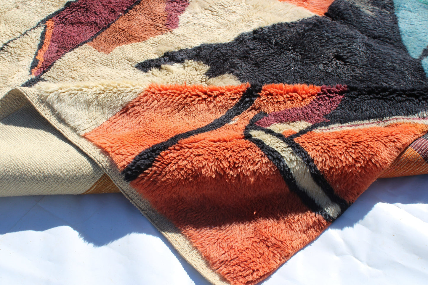 Beni Ourain rugs originate from the Atlas Mountains of Morocco and are characterized by their distinctive, neutral-toned, and geometric designs. These handwoven rugs often feature a plush pile and are made by the Berber tribes,  size is 270x192 cm