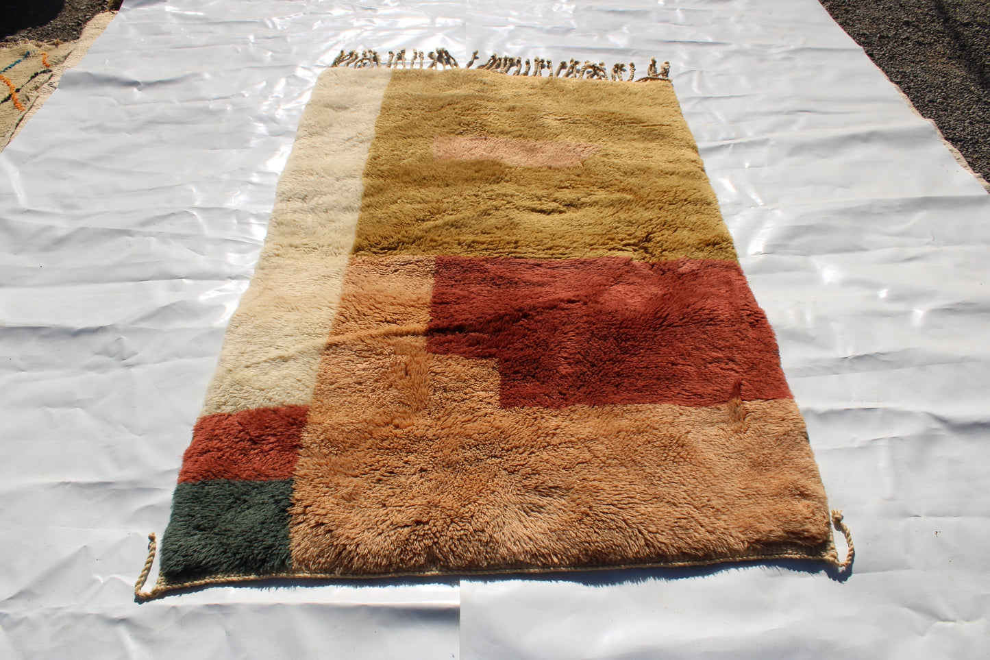 Copy of Beni Ourain rugs originate from the Atlas Mountains of Morocco and are characterized by their distinctive, neutral-toned, and geometric designs. These handwoven rugs often feature a plush pile and are made by the Berber tribes,  size is 190x120cm