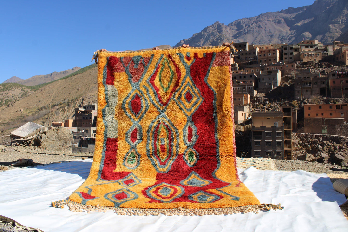 Beni Ourain rugs originate from the Atlas Mountains of Morocco and are characterized by their distinctive, neutral-toned, and geometric designs. These handwoven rugs often feature a plush pile and are made by the Berber tribes,  size is 270x180 cm