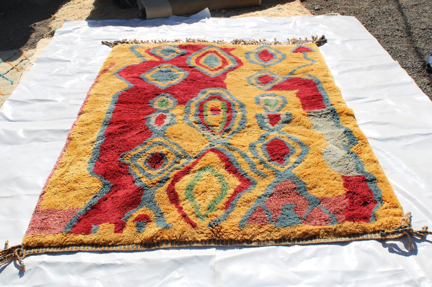 Beni Ourain rugs originate from the Atlas Mountains of Morocco and are characterized by their distinctive, neutral-toned, and geometric designs. These handwoven rugs often feature a plush pile and are made by the Berber tribes,  size is 270x180 cm