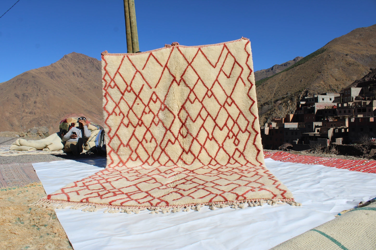 Beni Ourain rugs originate from the Atlas Mountains of Morocco and are characterized by their distinctive, neutral-toned, and geometric designs. These handwoven rugs often feature a plush pile and are made by the Berber tribes,  size is 280x177 cm