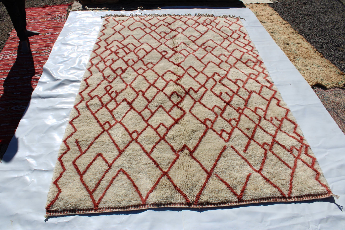 Beni Ourain rugs originate from the Atlas Mountains of Morocco and are characterized by their distinctive, neutral-toned, and geometric designs. These handwoven rugs often feature a plush pile and are made by the Berber tribes,  size is 280x177 cm