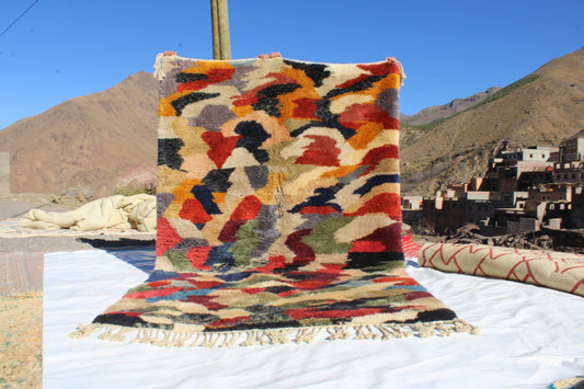 Beni Ourain rugs originate from the Atlas Mountains of Morocco and are characterized by their distinctive, neutral-toned, and geometric designs. These handwoven rugs often feature a plush pile and are made by the Berber tribes,  size is 280x177 cm