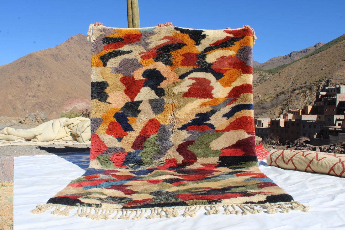 Beni Ourain rugs originate from the Atlas Mountains of Morocco and are characterized by their distinctive, neutral-toned, and geometric designs. These handwoven rugs often feature a plush pile and are made by the Berber tribes,  size is 280x177 cm