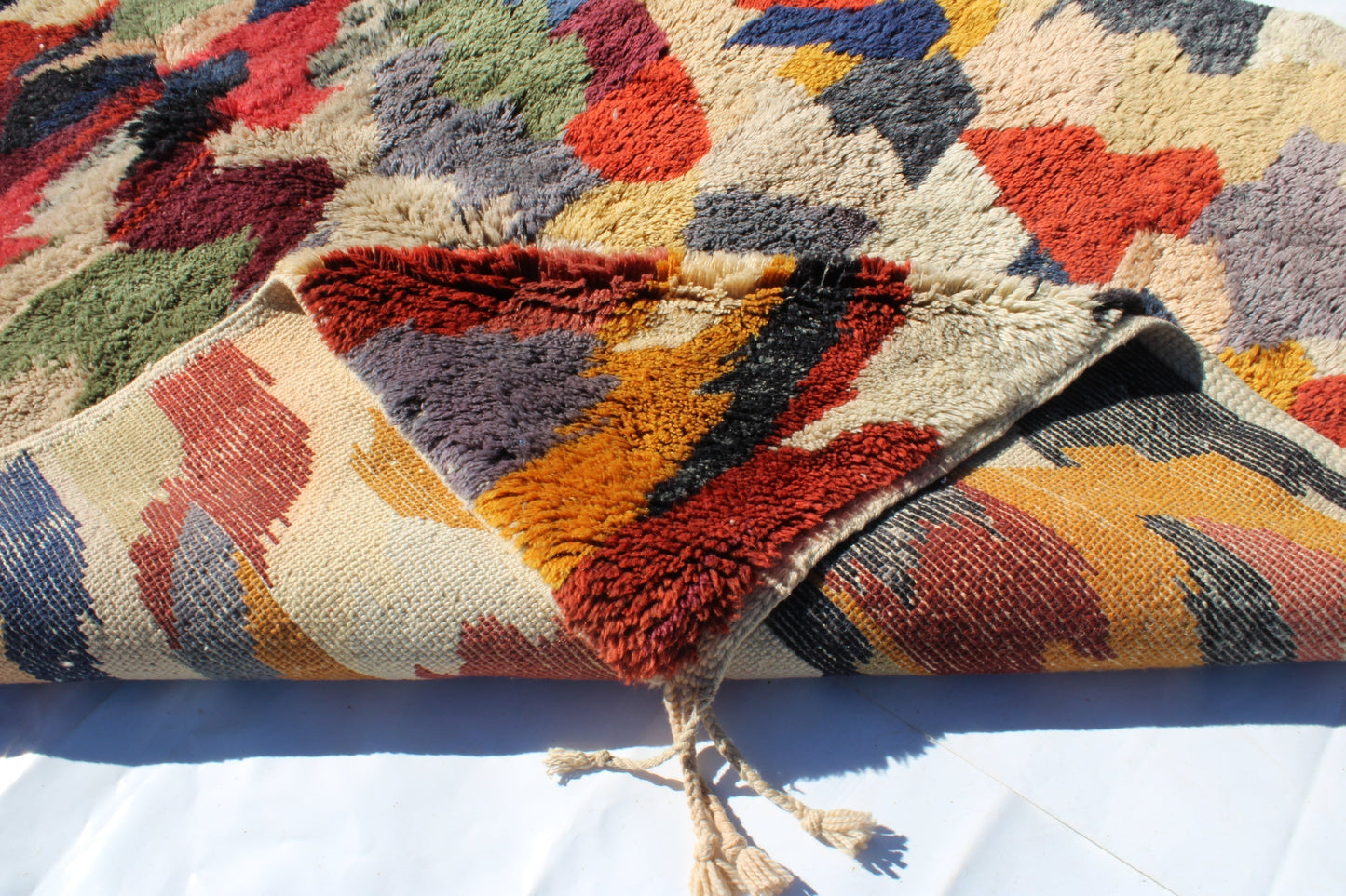 Beni Ourain rugs originate from the Atlas Mountains of Morocco and are characterized by their distinctive, neutral-toned, and geometric designs. These handwoven rugs often feature a plush pile and are made by the Berber tribes,  size is 280x177 cm