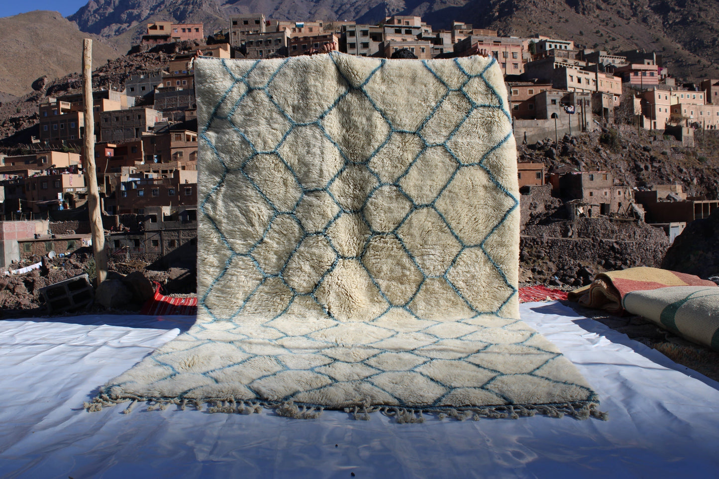 Beni Ourain rugs originate from the Atlas Mountains of Morocco and are characterized by their distinctive, neutral-toned, and geometric designs. These handwoven rugs often feature a plush pile and are made by the Berber tribes,  size is 280x177 cm