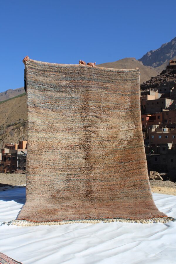 Beni Ourain rugs originate from the Atlas Mountains of Morocco and are characterized by their distinctive, neutral-toned, and geometric designs. These handwoven rugs often feature a plush pile and are made by the Berber tribes,  size is 250x155 cm - Image 3